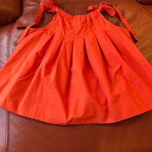 Super cute orange top from Anthropologie